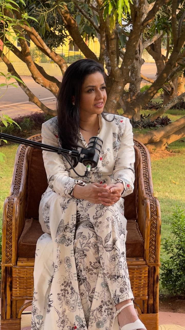 Divya Jain recording a podcast episode